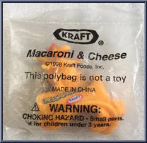 Cheesasaurus Rex from Cheesasaurus Rex - Keychains manufactured by Kraft [Front]