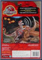 Alpha Velociraptor from Jurassic Park III - Electronic RE-AK A-TAK manufactured by Hasbro [Back]