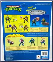 Machine Gunnin' Rocksteady from Teenage Mutant Ninja Turtles - Wacky Action manufactured by Playmates [Back]