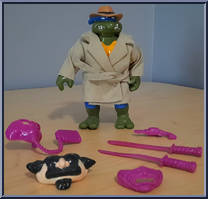 Undercover Leo from Teenage Mutant Ninja Turtles - Undercover Turtles (with Cards) manufactured by Playmates [Loose]